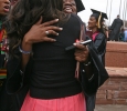 Leona Sandiford, theatre, hugs her friends and family at Midwestern State University fall graduation, Dec. 13, 2014 in Wichita Falls, Texas. Photo by Rachel Johnson