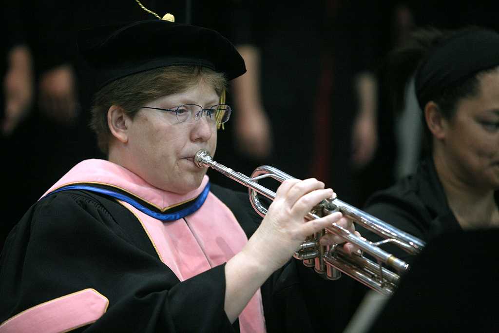Susan Harvey plays the national anthem at Midwestern State University graduation, May 13, 2017. Photo by Bradley Wilson