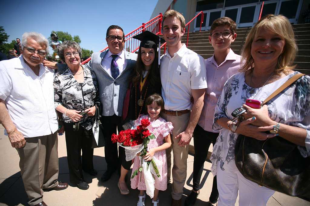Andrea Mendoza-Lespron with Luke Allen and family after  Midwestern State University graduation, May 13, 2017. Photo by Bradley Wilson