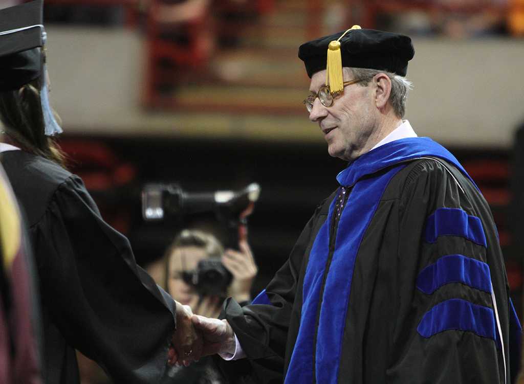 University President Jesse Rogers at Midwestenr State University graduation, May 10, 2014. Photo by Lauren Roberts