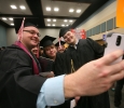 Music students pose for a selfie at Midwestern State University graduation, May 10, 2014. Photo by Ethan Metcalf