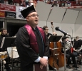 Jason Mincy, a senior in vocal music eduation, sings the alma mater at Midwestern State University graduation, May 10, 2014. Photo by Lauren Roberts