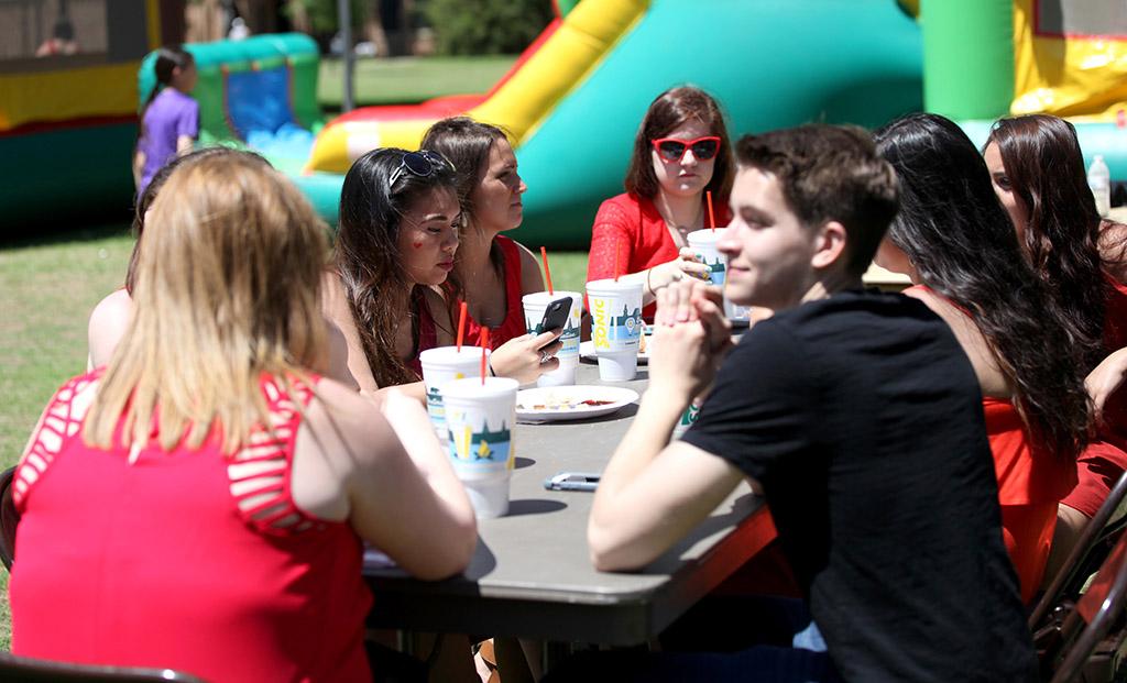 Students talked and ate at the Alphi Phi and Kappa Alpha's first annual Midwestern Cookout Classic in  the Quadrangle on April 30.Photo by Makayla Burnham