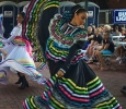 Members of Grupo Folklorico Faisan, a travelling group from California, perform at Calle Ocho on Oct. 1 at the downtown Farmer's Market. Photo by Emily Simmons