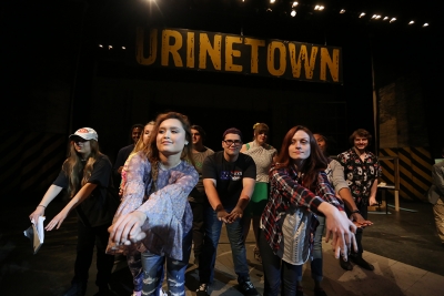 Steven Kintner and other cast members practice dance moves at "Urinetown" rehearsal Jan. 31. Photo by Bradley Wilson