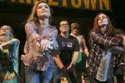 Steven Kintner and other cast members practice dance moves at "Urinetown" rehearsal Jan. 31. Photo by Bradley Wilson