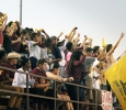 The "Stang Gang" leads the student section at the 2014 Homecoming game, also being the last game of season, on Saturday at Memorial Stadium. Sabina Marroquin, history education senior, won 2014 Homecoming Queen and Elijah wire, sport and leisure studies senior, won 2014 Homecoming King. Photo by Rachel Johnson