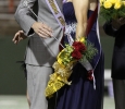 Sabina Marroquin, history education senior, won 2014 Homecoming Queen and Elijah wire, sport and leisure studies senior, hug with excitement when they find out the won 2014 Homecoming Queen and King, Saturday night at Memorial Stadium. Photo by Rachel Johnson