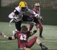 Adam Hill, history sophomre, tackles Commerce's Vernon Johnson, senior wide reciever, in the game between Midwestern State University and Texas A&M-Commerce, Saturday, Oct. 25, 2014 at Memorial Stadium. Photo by Lauren Roberts