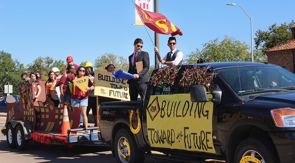 The Residant Hall Assoctiation's float in the annual Homecoming Parade which went around the whole campus and started from the parking lot by the football practice field and ended by the quad on Saturday morning. They will announce the winners for best float at the Homecoming football game Saturday night. Photo by Rachel Johnson