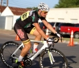 Sean Brown, graduate in exercise physiology, rides in the Hotter 'N Hell men's crit races Friday afternoon.
