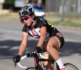 Ashley Weaver, senior in exercise physiology, rides in the Hotter 'N Hell women's crit races Friday afternoon.