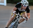 Cory Scott, graduate student in exercise physiology, rides in the Hotter 'N Hell men's crit races Friday afternoon.