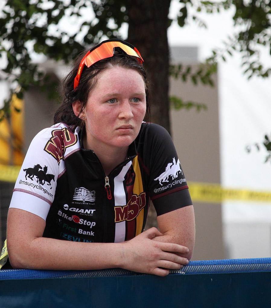 Maxyna Cottam, freshmen, watches races from the sidelines during the Hotter n' Hell races, Friday. Photo by Kayla White.