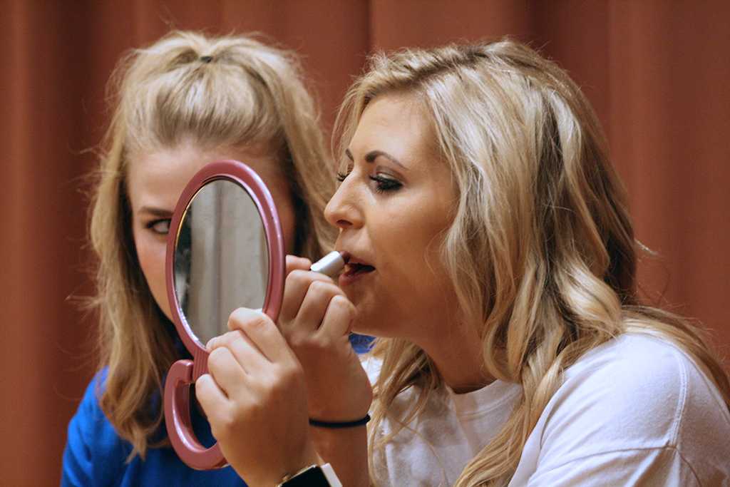 Tori Phillips, radiology sophomore, preparing for the Lip Sync competition backstage in the Akin Auditorium. 24 Oct. Photo by Bridget Reilly