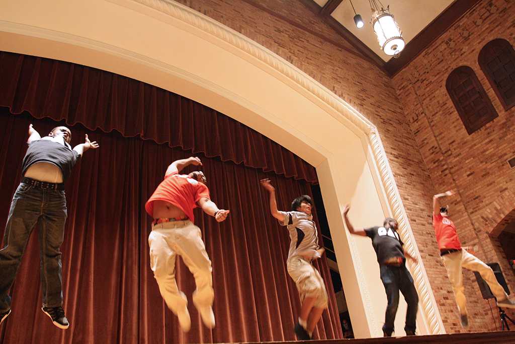 Omega Delta Phi performing their last dance move at the Lip Sync competition in Akin Auditorium. 24 Oct. Photo by Bridget Reilly