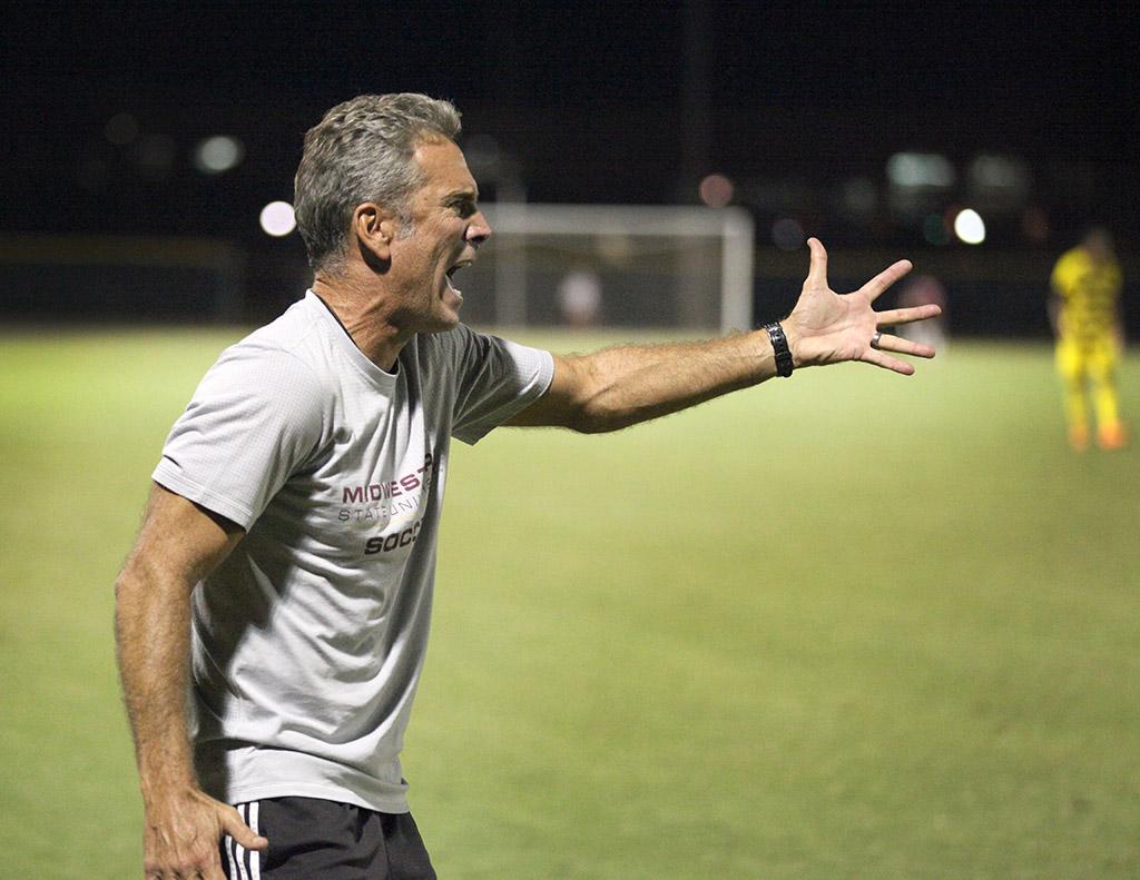 Doug Elder, head men's soccer coach, yells at the referee for not giving his team a corner in MSU v St. Edward's University where MSU beat St. Edward's 3-2 Oct, 8. Photo by Francisco Martinez