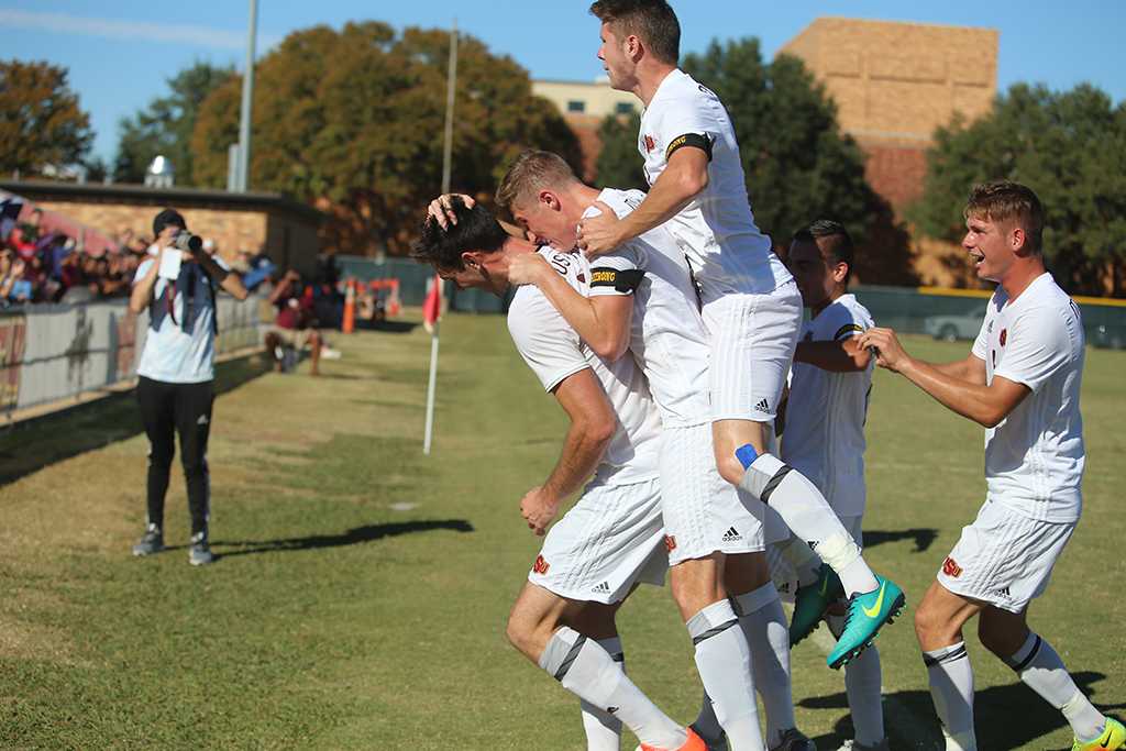 Players react after Scott Doney scored the first and only goal during the Heartland Conference championship game aginst St. Edwardâs University. MSU won 1-0. Photo by Bradley Wilson