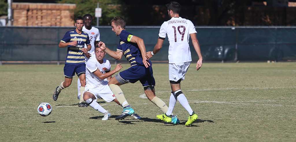 Carlos Flores tries to block a player during the Heartland Conference championship game aginst St. Edwardâs University. MSU won 1-0. Photo by Bradley Wilson