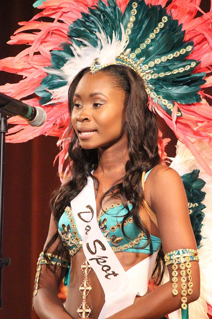 Kornika Deganes, finance junior, introduces herself in the first round of the 2015 CaribFest Pageant, the ice breaker portion, which was the only part of the competition that was not judged, Sept. 23. Photo by Rachel Johnson