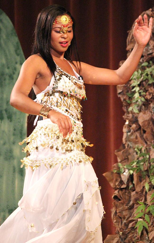 Joslyn Le Blanc, biology sophomore, performs in the talent portion of the 2015 CaribFest Pageant, Sept. 23. Photo by Rachel Johnson