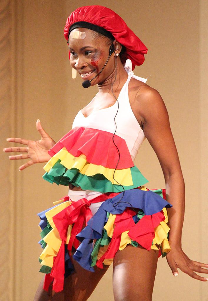 Kornika Degannes, finance junior, performs in the talent portion of the 2015 CaribFest Pageant with a combination of a song, dance, and monologue on domestic violence, Sept. 23. Photo by Rachel Johnson