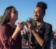 Caitlin Cooper, BAAS senior, & Zach Alvarez, education freshman enjoying the tailgate party before the start of the football game against Angelo State on Oct. 15. Photo by Izziel Latour