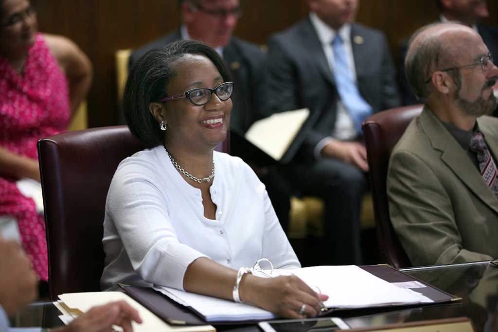 Tiffany Burks, board of regents member, listens to discussion at the Board of Regents meeting on Aug. 4.