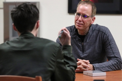 Frank Warren, Artist-Lecture Series guest speaker, the creator of Post Secret, an ongoing community mail art project where people mail in their secrets anonymously, answers questions from Wichitan Editor and Mass Communication senior Tyler Manning before Warren gave his presentation to an audience in Akin Auditorium, Thurs., Jan. 18, 2018. Photo by Rachel Johnson