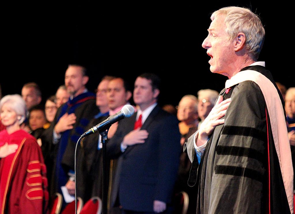 After Sheppard Air Force Base honor guard performed the presentation of colors, Don Maxwell, music professor, sang "The Star Spangled Banner" to start off the Inaguartion of Suzanne Shipley, eleventh president, held in the Fain FIne Arts Auditorium, Dec. 11. Photo by Rachel Johnson