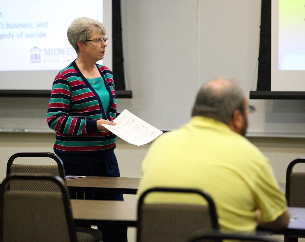 Vikki Chaviers, licensed professional counselor, speaks at the QPR suicide prevention training for faculty, on April 12 in Dillard 189. Photo by Rutth Mercado.