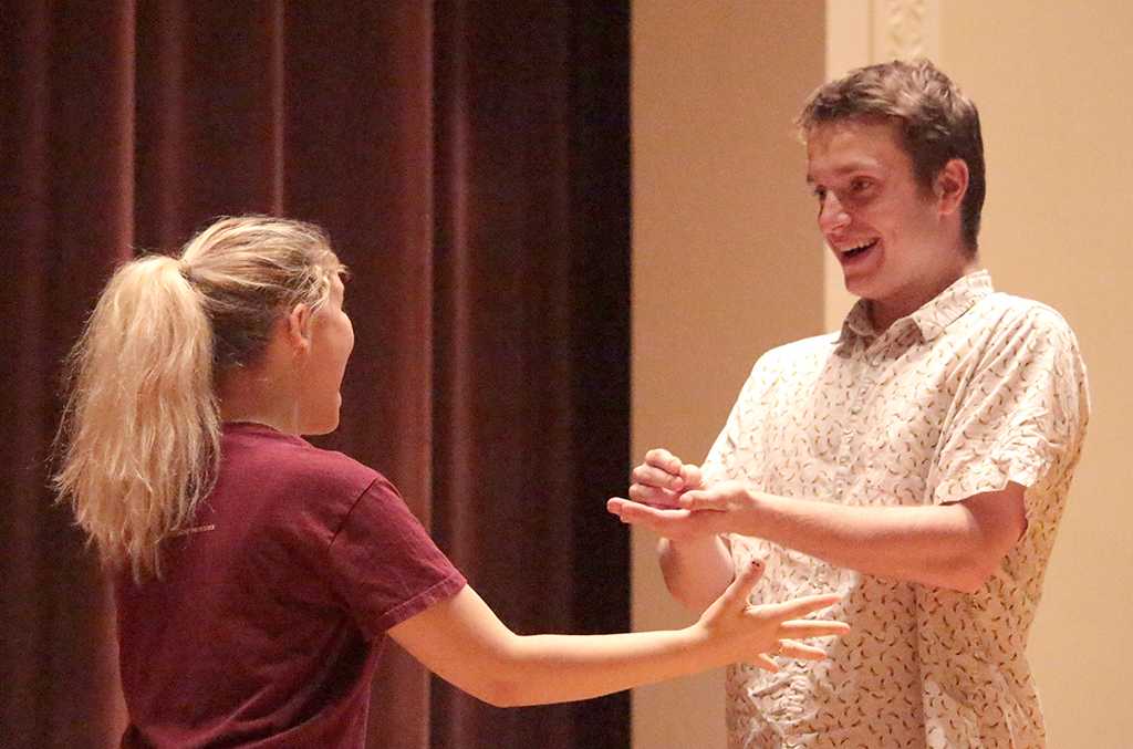 Tessa Rae Dschaak, theatre sophomore, acting with Jonathan Stone, theatre junior, with tea as a metaphor as a positive consent response at the Since Last Night performed by the theatre in Akin Auditorium on Aug 25th. Photo by Kayla White.