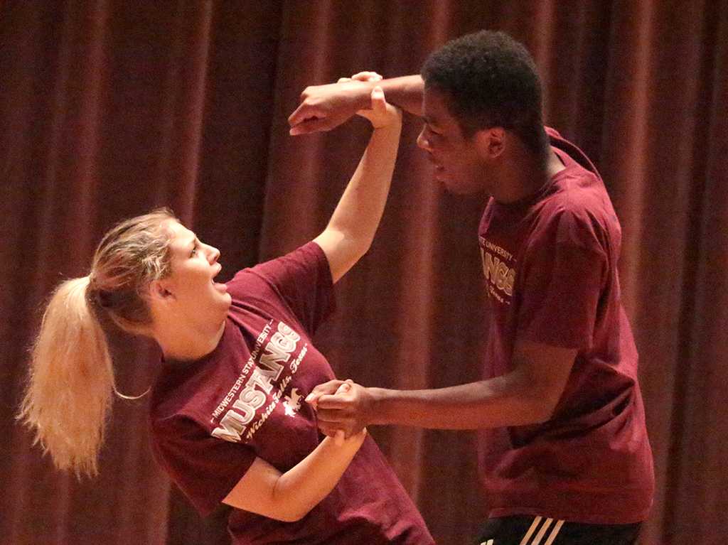 Tessa Rae Dschaak, theatre sophomore, with Xavier Alexander, theatre sophomore, as a negative consent response at the Since Last Night performed by the theatre in Akin Auditorium on Aug 25th. Photo by Kayla White.