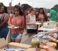 Students pass through line for free burgers and hot dogs at the Party at the soccer field on Aug 23rd in the parking lot of the soccer field. Photo by Kayla White.