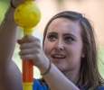 Katy Meadows, accounting freshman, builds a structure as part of Roundup Olympics on the Quad. Photo by Izziel Latour