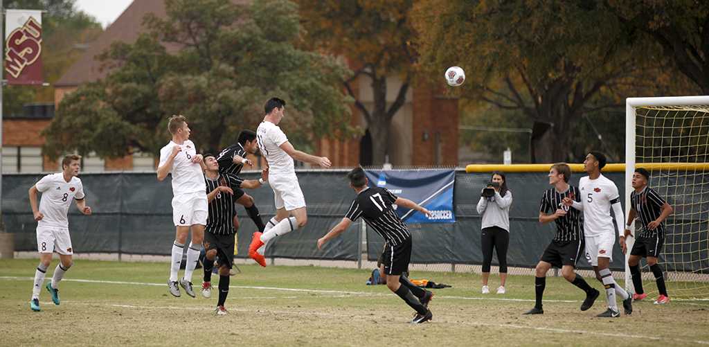 Scott Doney, psychology senior, attempts a header towards the goal during the NCAA Division 2 South Central Regional game vs Colorado Mesa, where MSU won 3-0, Sunday, Nov. 12, 2017. Photo by Francisco Martinez