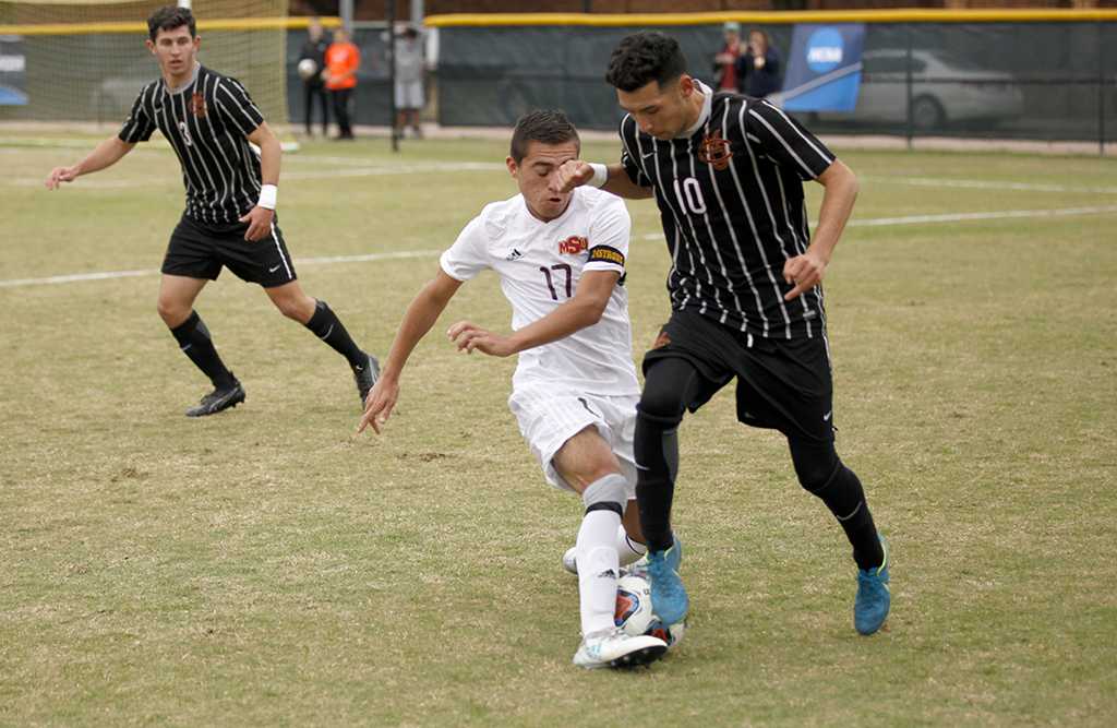 Carlos Flores, sports medicine freshman, cuts off the ball from moving forward during the NCAA Division 2 South Central Regional game vs Colorado Mesa, where MSU won 3-0, Sunday, Nov. 12, 2017. Photo by Francisco Martinez