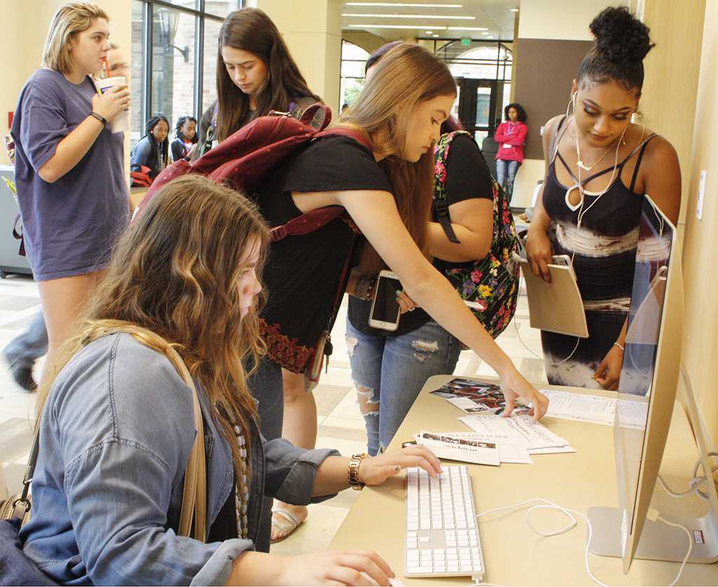 Students register at Social Media Day in the Legacy Multipurpose room on Sept. 25. photo by Shea James