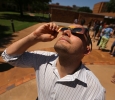 Walter Lambert, business analyst at the Small Business Development Center, watches the eclipse at the solar eclipse watch party Aug. 21, 2017 on Sunwatcher Plaza at Midwestern State University. Photo by Bradley Wilson