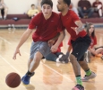 Mike Lopez, sports and leisure sophomore, attempts to dribble the ball past Keon Duren, associates from Vernon, and make a basket during the basketball tounament, Swishes 4 Wishes, put on by Chi Omega, March 12. Photo by Rachel Johnson