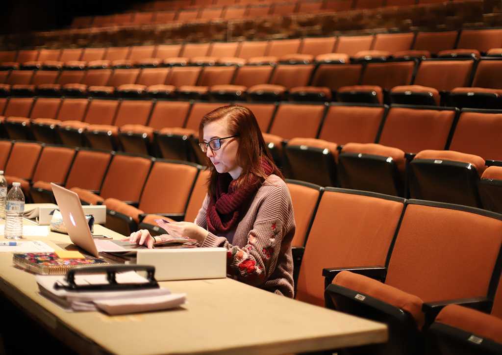 Katie Cagle, stage manager, at the first rehearsal for Urinetown, Jan. 16, 2018. Photo by Bradley Wilson