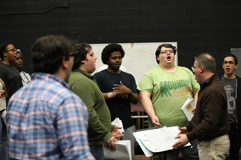 Cast members for "Urinetown" practice lines at rehersals in the Bea Wood Theatre on Jan. 17. Photo by Latoya Fondren