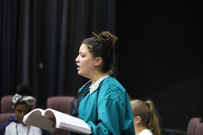 Ellanor Collins sings at rehearsal for the production of "Urinetown" on Jan. 17. Photo by Latoya Fondren