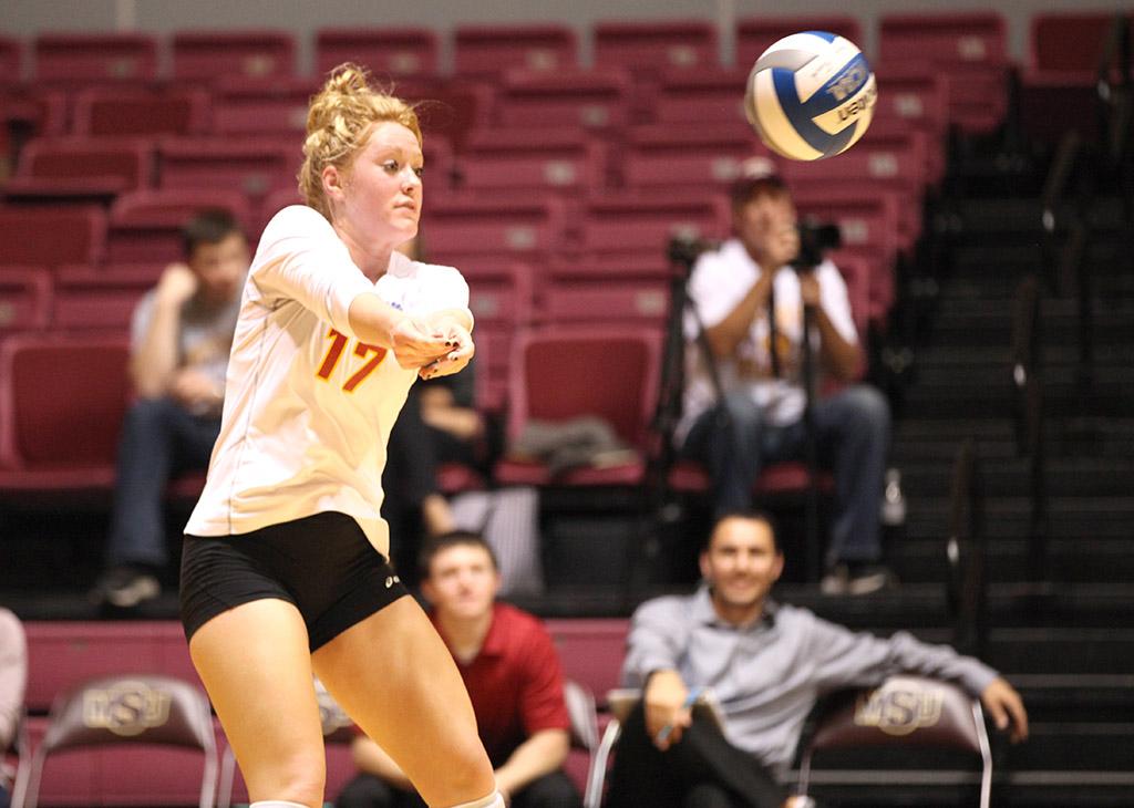 Meghan Bettis, undecided sophomore, passes the ball to the setter during the game held in D.L. Ligon Coliseum, Oct. 27.  MSU lost to Eastern New Mexicos 1-3. Photo by Rachel Johnson