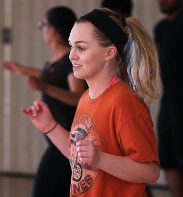 Caitlin Weaver, marketing freshman, is participates in the Zumbathon Fundraiser with BESO at Sikes Lake Center on Oct.12. Photo by Harlie David
