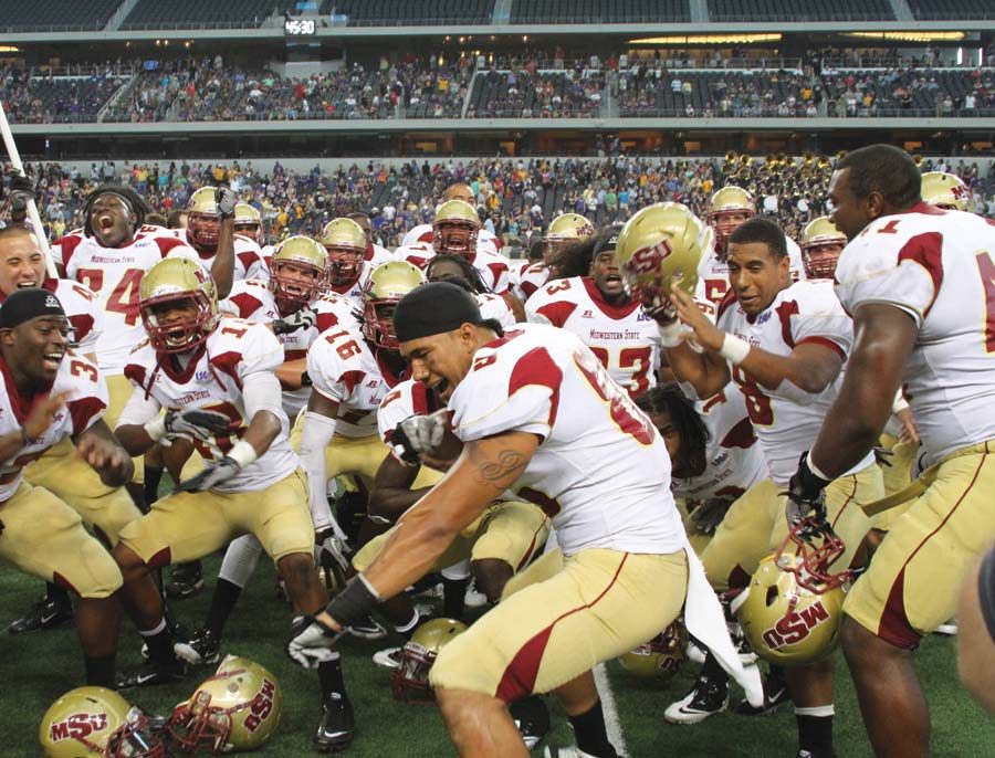Midwestern State Football team celebrates the Saturday afternoon victory.