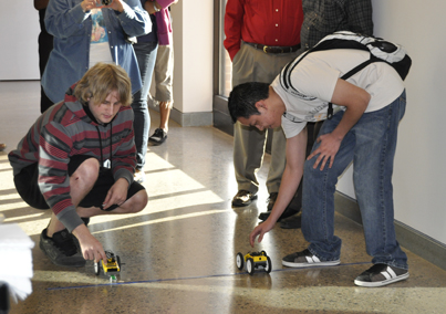 Engineering students racing their robot cars. (Photo by Hannah Hofmann)