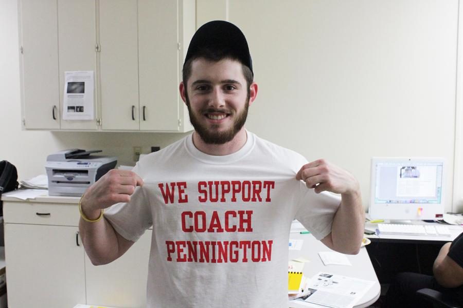 Landry Russell showing his support for WFHS Coach Pennington. (Photo by Chris Collins)