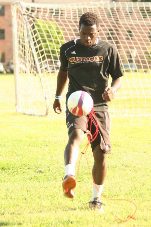Junior striker VcMor Eligwe juggles a ball at the free play fields. Photo by Damian Atamenwan