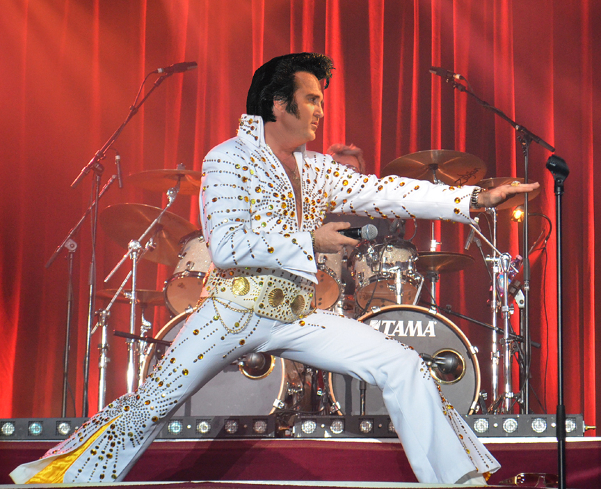 Kraig Parker poses as Elvis during  a performance of The King: Eras of a Legend
Photo Courtesy of TheKingLive